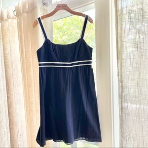LIQUID Size Medium blue dress with blue and white ribbon straps and detail.